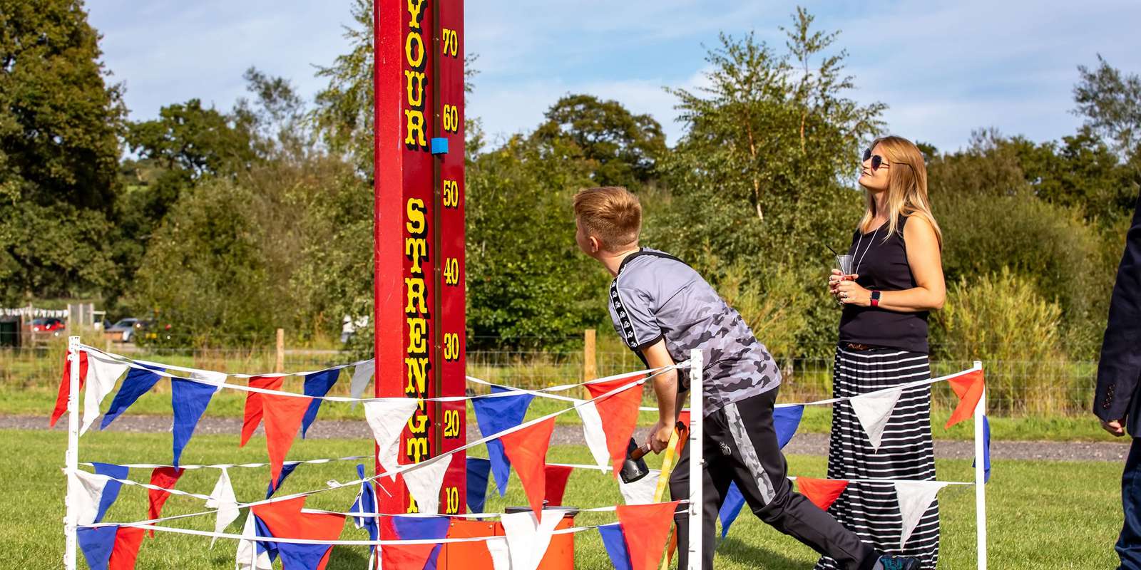 Test your strength Outdoor venue games for corporate family fun days