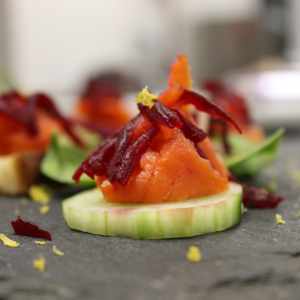 Salmon and beetroot canapes on slates wedding & events catering